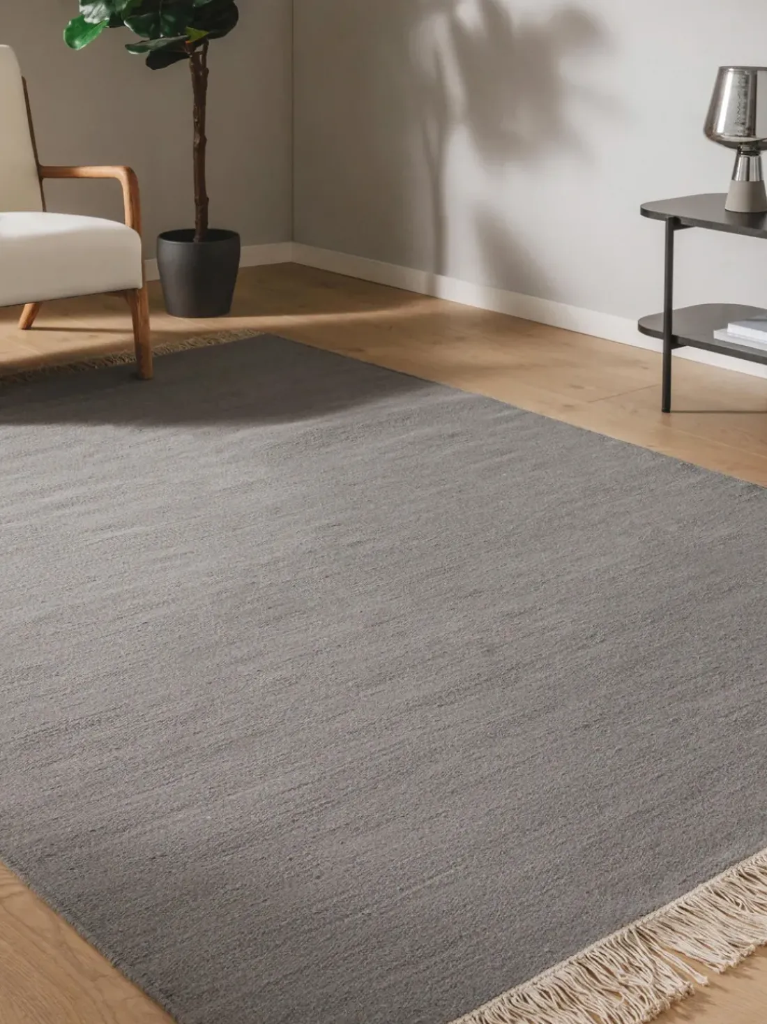 Alfombra artesanal de lana con flecos Liv