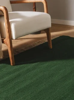 Alfombra artesanal de lana con flecos Liv