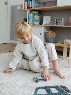 Alfombra infantil redonda artesanal con efecto alto-bajo Wheels, lavable