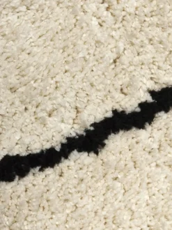 Alfombra redonda artesanal de pelo largo Naima