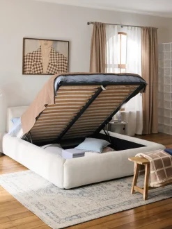 Cama tapizada con espacio de almacenamiento Melva