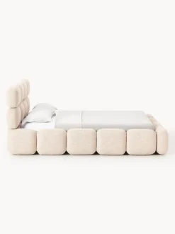 Cama tapizada en tejido bouclé con espacio de almacenamiento Tayla