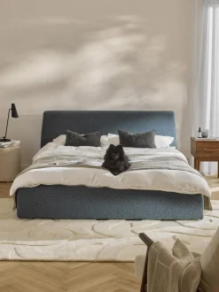 Cama tapizada en tejido bouclé con espacio de almacenaje Cloud