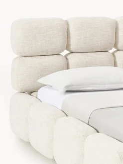 Cama tapizada en tejido bouclé con espacio de almacenamiento Tayla