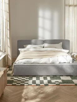 Cama tapizada en tejido bouclé con espacio de almacenamiento Lennon