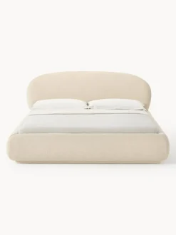 Cama tapizada redondeada en tejido bouclé Alba