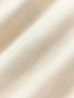 Funda de cojín artesanal con motivos geométricos Asta