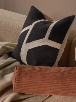 Funda de cojín artesanal con motivos geométricos Asta