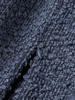 Funda de cojín en tejido bouclé Bellamie