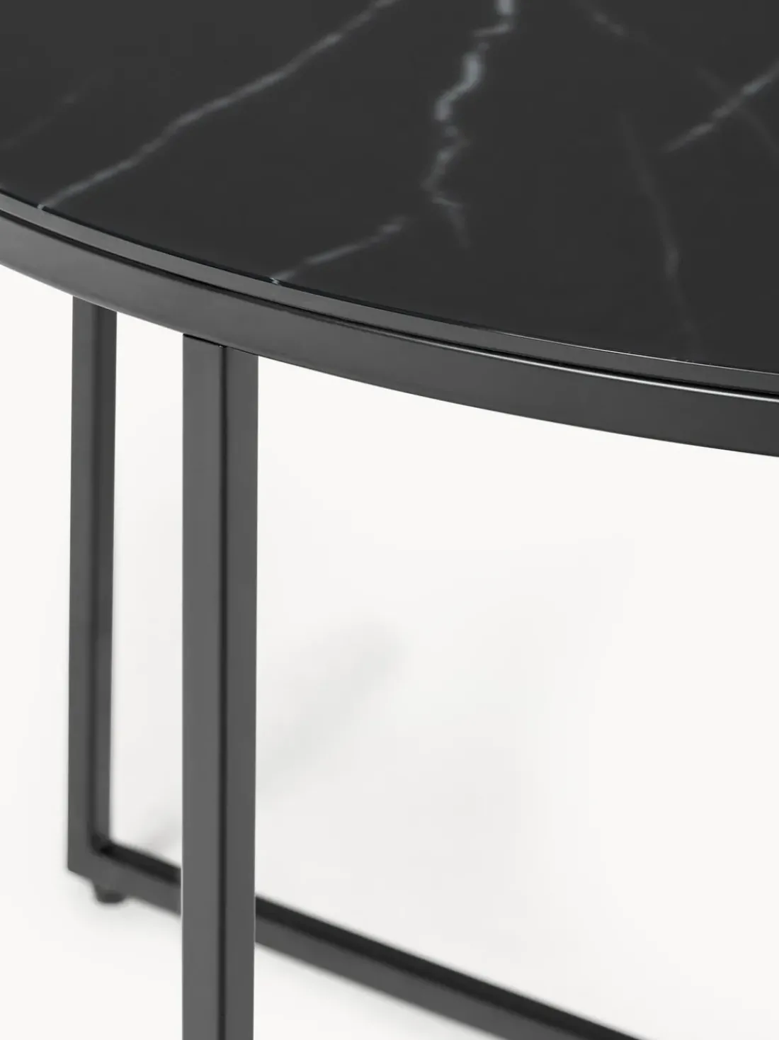 Mesa de centro redonda con tablero de vidrio en look mármol Antigua