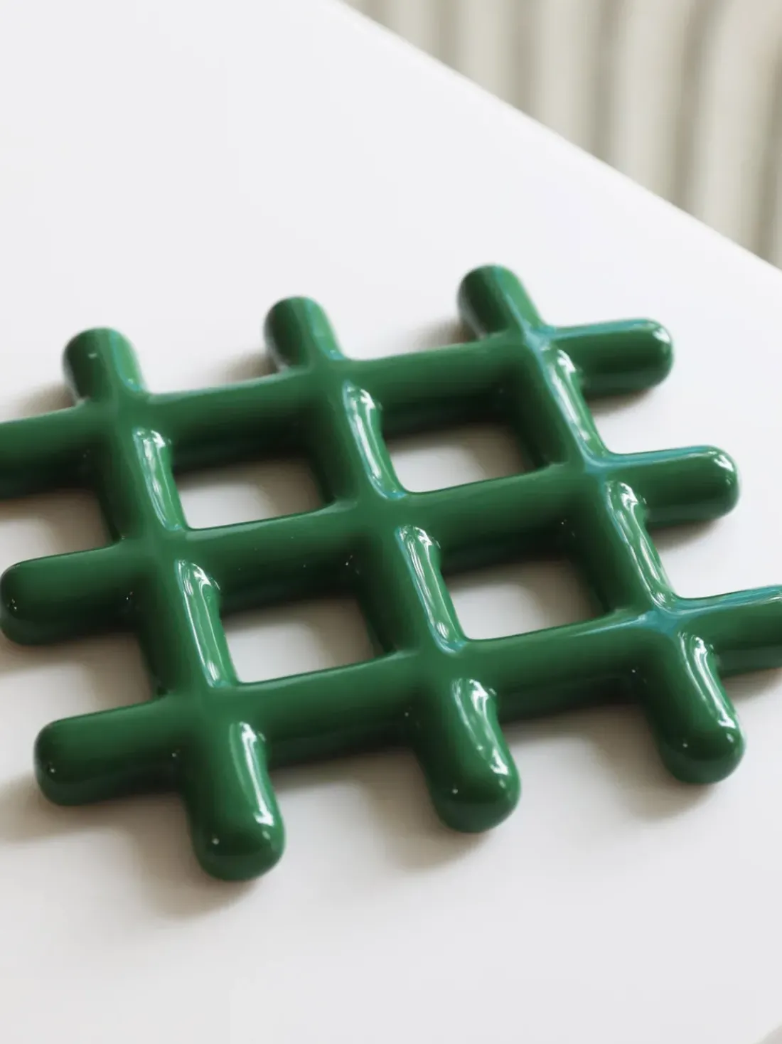Salvamanteles Grid