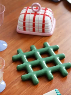 Salvamanteles Grid