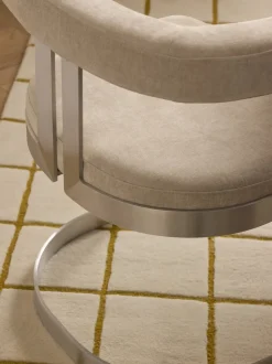 Silla cantilever tapizada Gianni