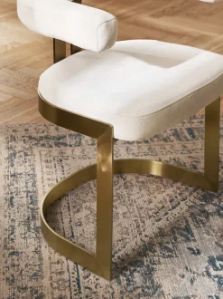 Silla cantilever tapizada Gianni