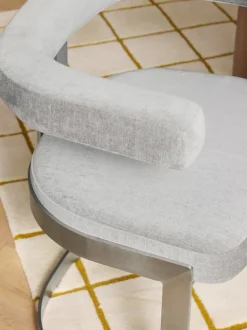 Silla cantilever tapizada Gianni
