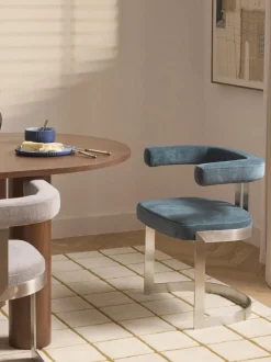 Silla cantilever tapizada Gianni