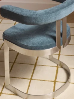 Silla cantilever tapizada Gianni