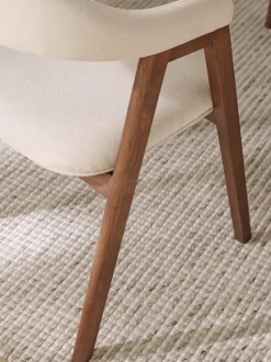 Silla con reposabrazos tapizada Nik
