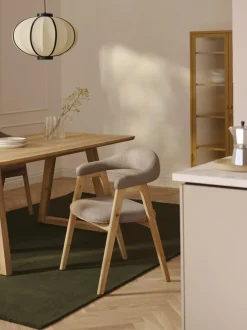 Silla con reposabrazos tapizada Nik