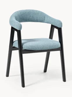 Silla con reposabrazos tapizada en tejido bouclé Nik