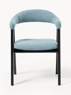 Silla con reposabrazos tapizada en tejido bouclé Nik