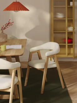 Silla con reposabrazos tapizada Nik