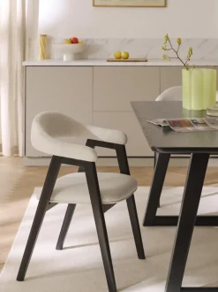Silla con reposabrazos tapizada Nik