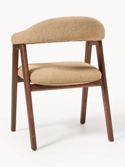 Silla con reposabrazos tapizada en tejido bouclé Nik