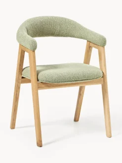 Silla con reposabrazos tapizada en tejido bouclé Nik