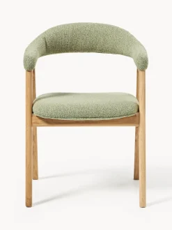 Silla con reposabrazos tapizada en tejido bouclé Nik
