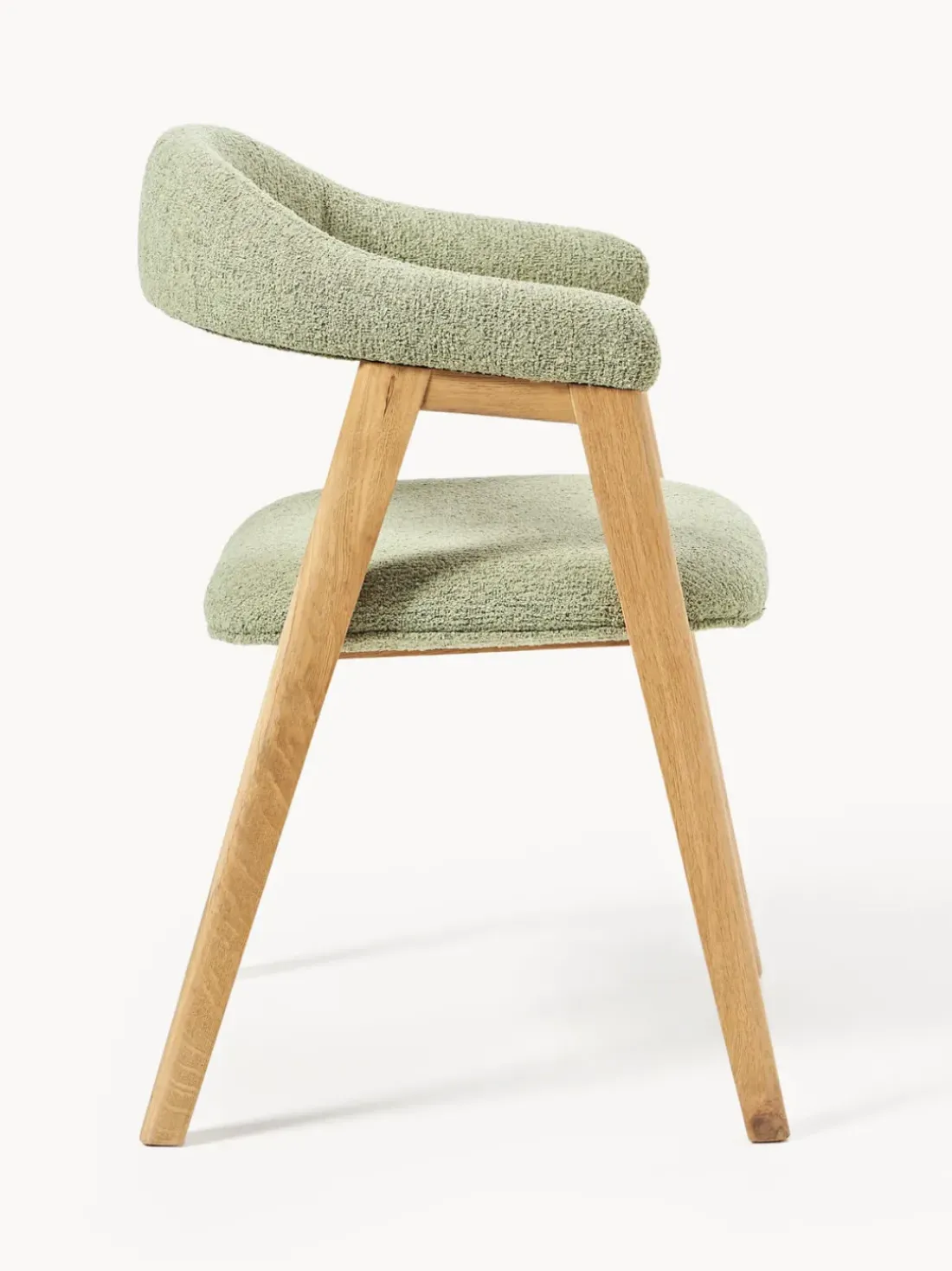 Silla con reposabrazos tapizada en tejido bouclé Nik