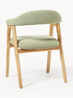Silla con reposabrazos tapizada en tejido bouclé Nik