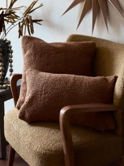 Sillón de borreguillo con reposabrazos Moritz