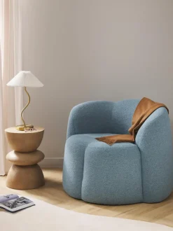 Sillón en tejido bouclé Fleur