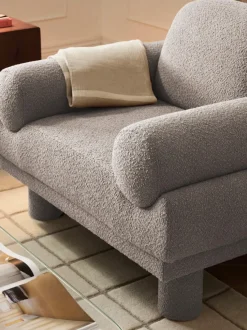Sillón en tejido bouclé Lilo