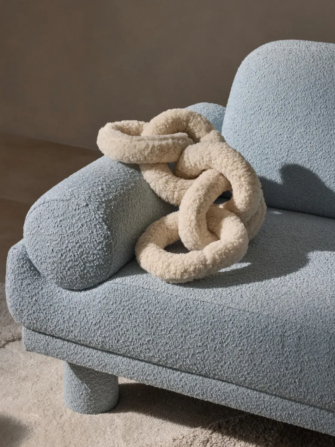 Sillón en tejido bouclé Lilo