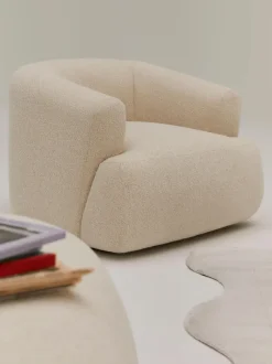 Sillón en tejido bouclé Sofia