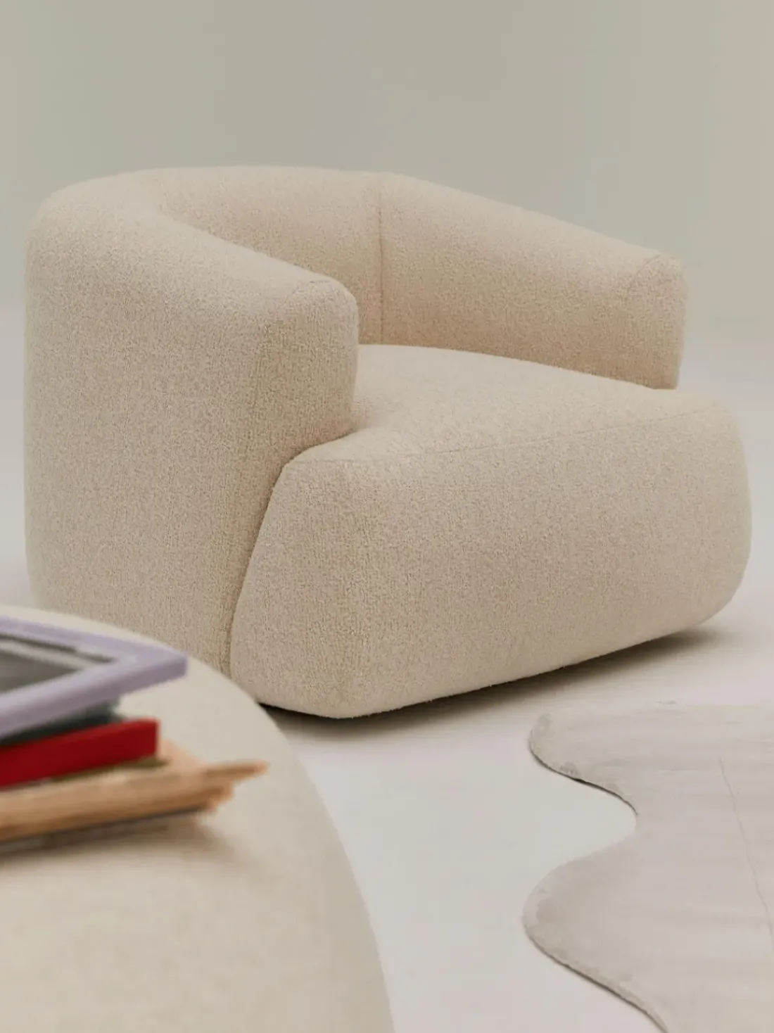 Sillón en tejido bouclé Sofia