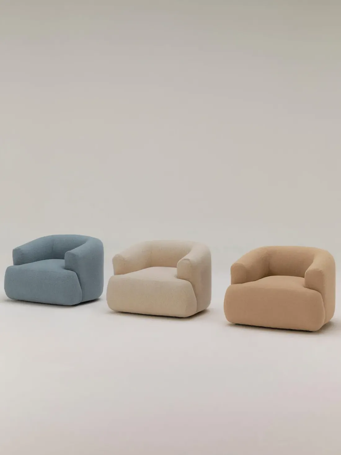 Sillón en tejido bouclé Sofia