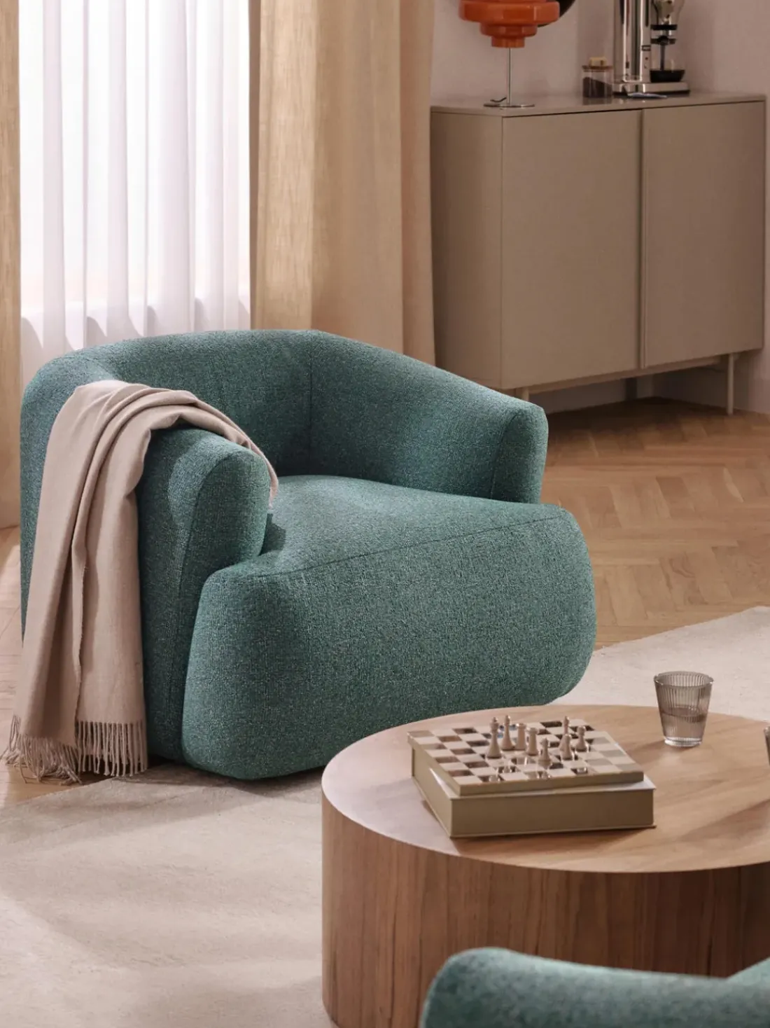 Sillón en tejido bouclé Sofia