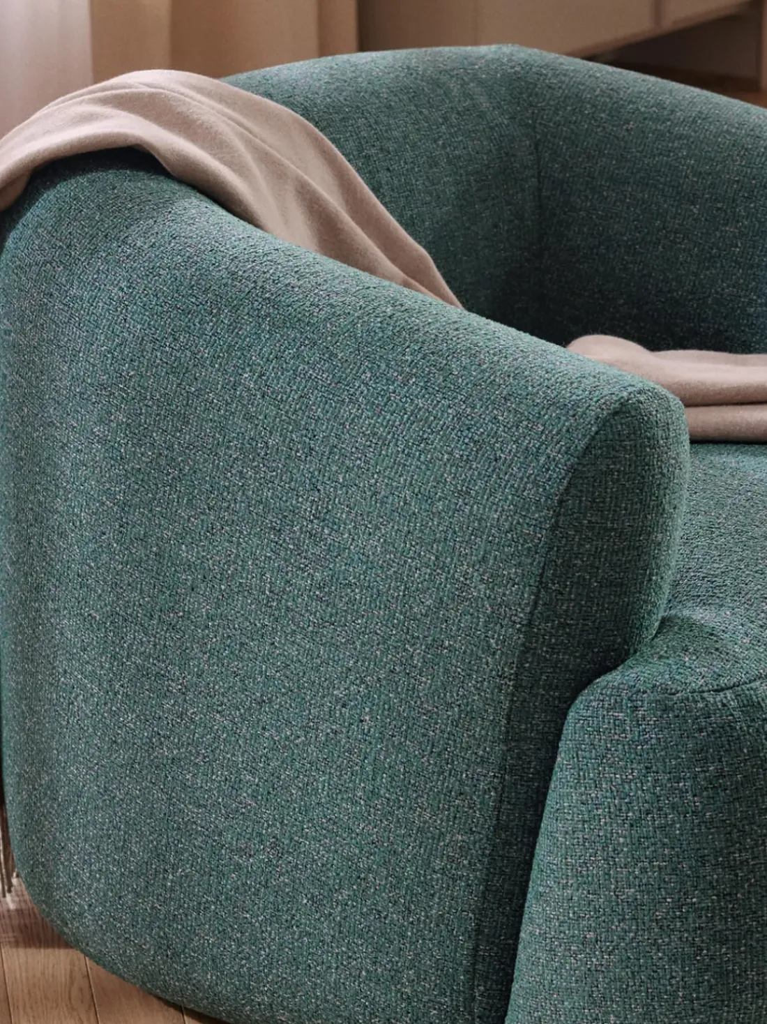 Sillón en tejido bouclé Sofia