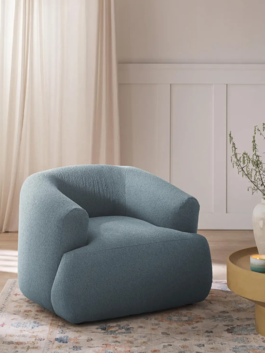 Sillón en tejido bouclé Sofia