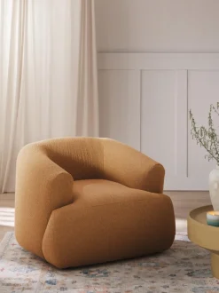 Sillón en tejido bouclé Sofia