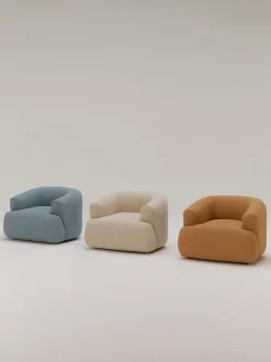 Sillón en tejido bouclé Sofia