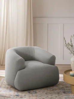Sillón en tejido bouclé Sofia