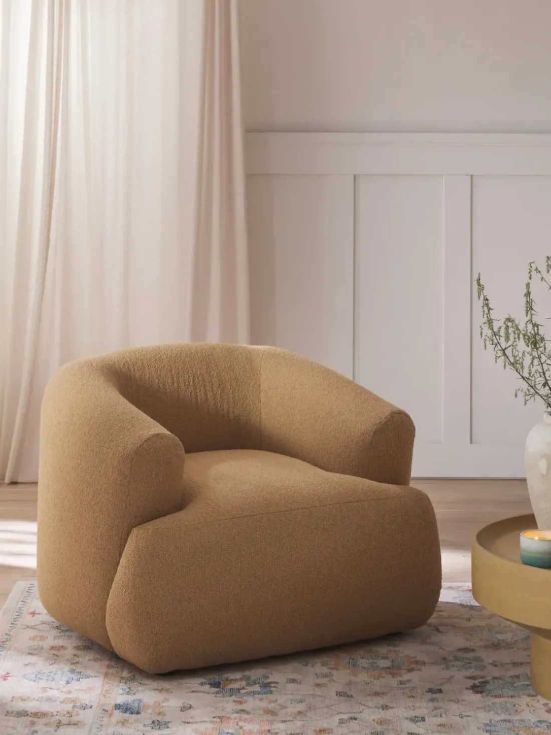 Sillón en tejido bouclé Sofia