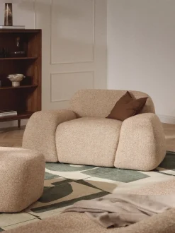 Sillón en tejido bouclé Wolke