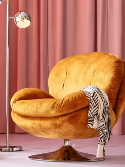 Sillón giratorio de terciopelo Cosy