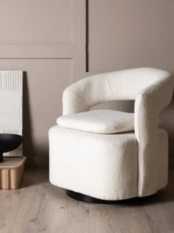 Sillón giratorio en tejido bouclé Laurel