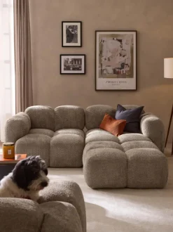 Sofá modular de borreguillo bouclé con reposapiés Tayla (3 plazas)